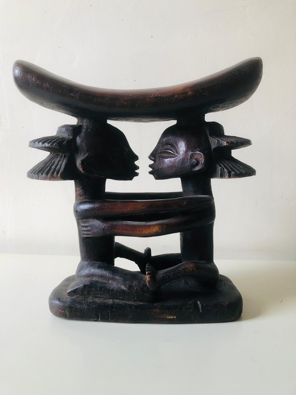 Carved West African headrest